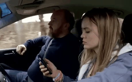 Stop playing with your phone, just look at the road GIF