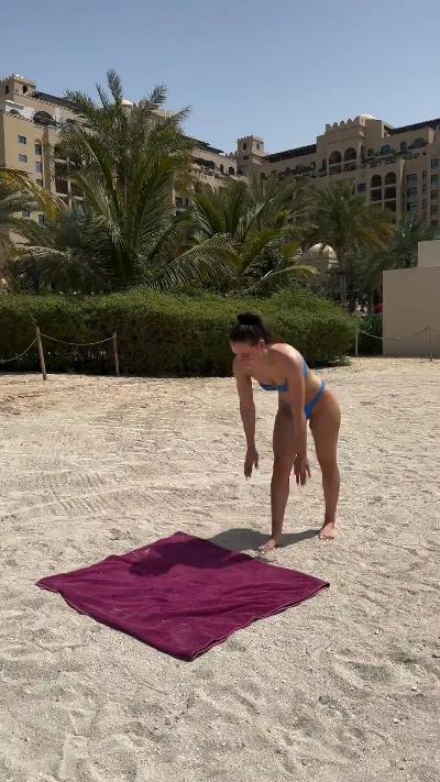 Handstand exercise on beach