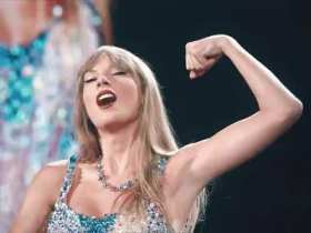 Taylor Swift shows off her arm muscles and kisses her arms short MP4 video
